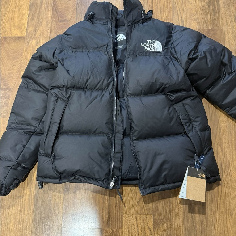 The North Face Black Quilted Puffer Jacket with Hood. Unisex. Never worn.